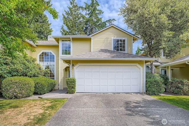 15831 Northup Way Unit 26, Bellevue, WA 98008 - traditional-style house with driveway and an attached garage