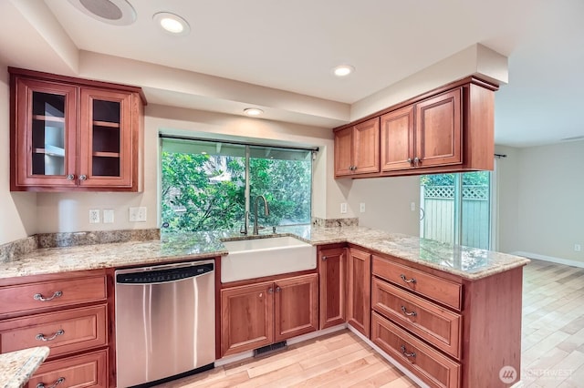 15831 Northup Way Unit 26, Bellevue, WA 98008 - kitchen with stainless steel dishwasher, light wood finished floors, plenty of natural light, and recessed lighting
