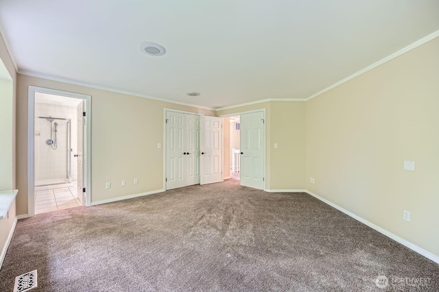 15831 Northup Way Unit 26, Bellevue, WA 98008 - unfurnished bedroom with carpet, ornamental molding, ensuite bath, and a closet