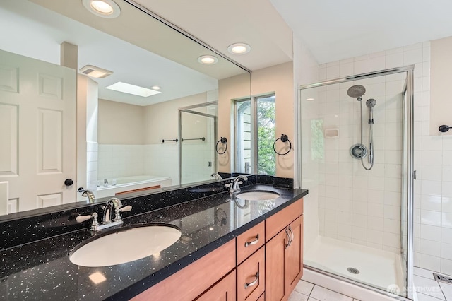 15831 Northup Way Unit 26, Bellevue, WA 98008 - full bath with a shower stall, a bath, double vanity, recessed lighting, and tile patterned flooring