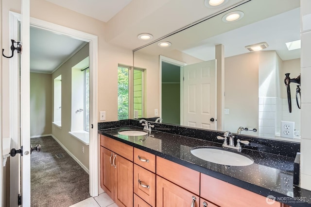 15831 Northup Way Unit 26, Bellevue, WA 98008 - bathroom with double vanity, recessed lighting, and a skylight