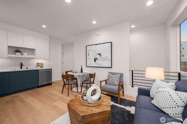 222B 10th Ave E, Seattle, WA 98102 - living area featuring light wood-style floors and recessed lighting