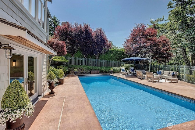 6581 156th Ave SE, Bellevue, WA 98006 - view of swimming pool featuring an outdoor hangout area, a patio area, and a fenced backyard