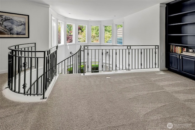 6581 156th Ave SE, Bellevue, WA 98006 - hallway with an upstairs landing, plenty of natural light, carpet flooring, and ornamental molding