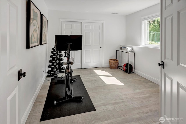 6581 156th Ave SE, Bellevue, WA 98006 - workout area featuring baseboards and wood finished floors