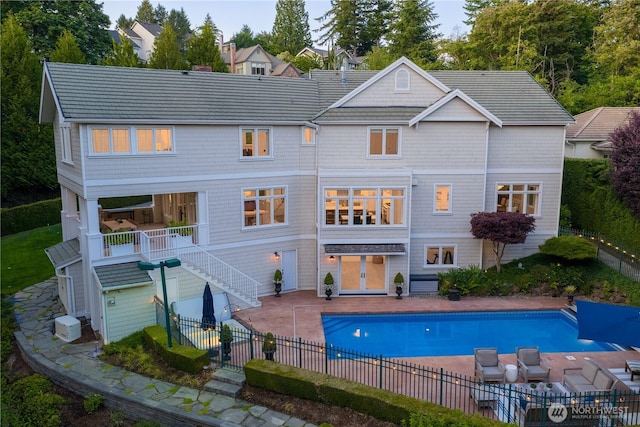 6581 156th Ave SE, Bellevue, WA 98006 - back of house featuring stairway, a fenced backyard, and a patio area