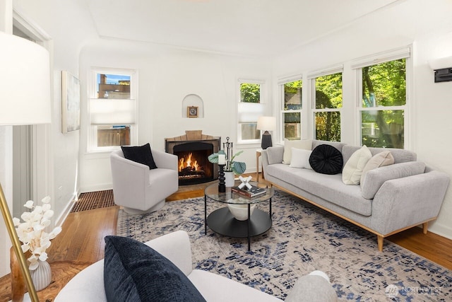 3112 NE 65th St, Seattle, WA 98115 - living room with wood finished floors and a warm lit fireplace