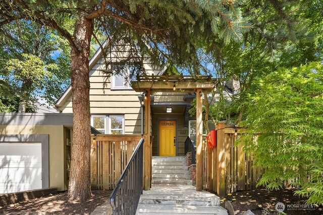 3112 NE 65th St, Seattle, WA 98115 - property entrance with an attached garage