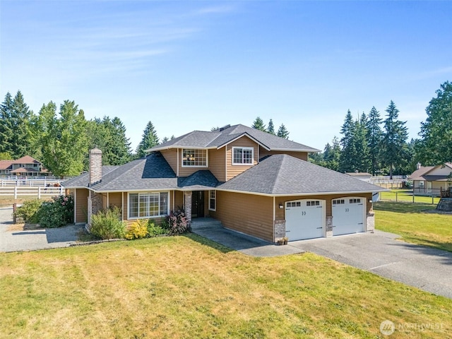 9321 339th St S Unit 5, Roy, WA 98580 - view of front of home with a garage, driveway, a chimney, and a shingled roof