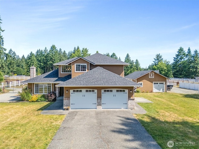 9321 339th St S Unit 5, Roy, WA 98580 - view of front of home with driveway, an attached garage, roof with shingles, and a chimney