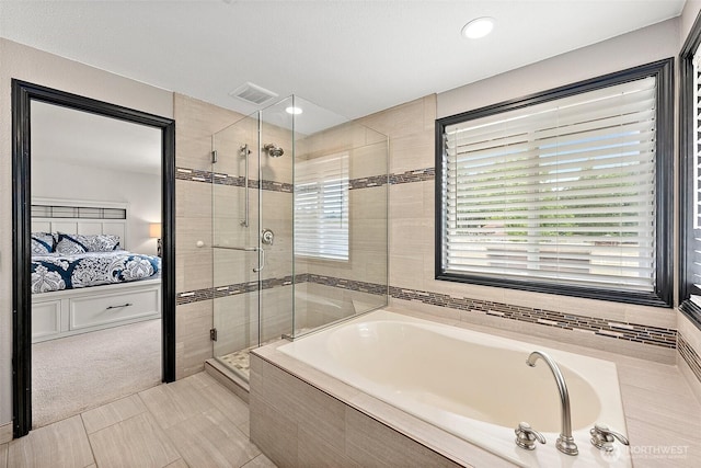 9321 339th St S Unit 5, Roy, WA 98580 - ensuite bathroom with a bath, a shower stall, healthy amount of natural light, and recessed lighting