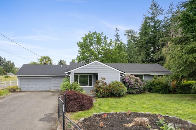 2220 91st St E, Tacoma, WA 98445 - single story home with asphalt driveway and an attached garage