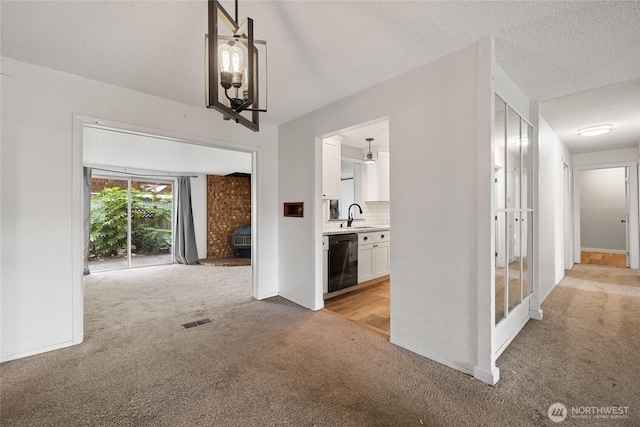 2220 91st St E, Tacoma, WA 98445 - corridor with light carpet and a textured ceiling