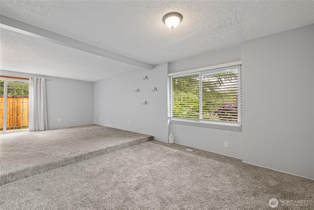 2220 91st St E, Tacoma, WA 98445 - unfurnished room featuring a textured ceiling and carpet flooring
