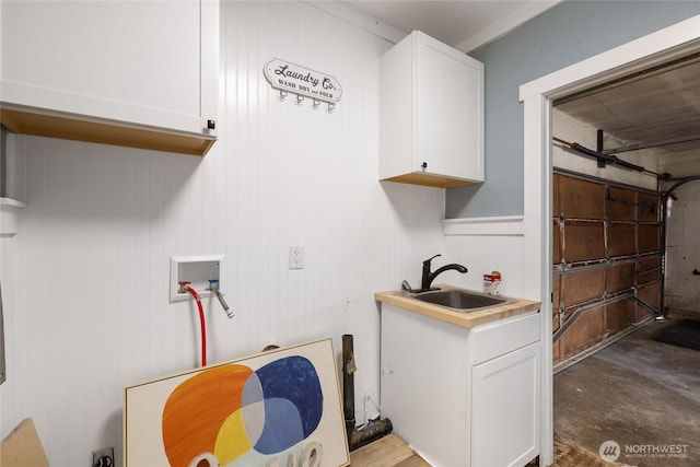 2220 91st St E, Tacoma, WA 98445 - washroom featuring cabinet space and hookup for a washing machine