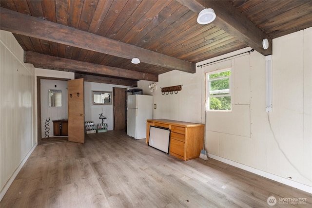 2220 91st St E, Tacoma, WA 98445 - kitchen with freestanding refrigerator, light wood finished floors, refrigerator, and a wood ceiling with exposed beams