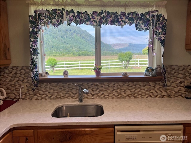 158 Skaggs Rd, Morton, WA 98356 - kitchen with dishwasher and tasteful backsplash