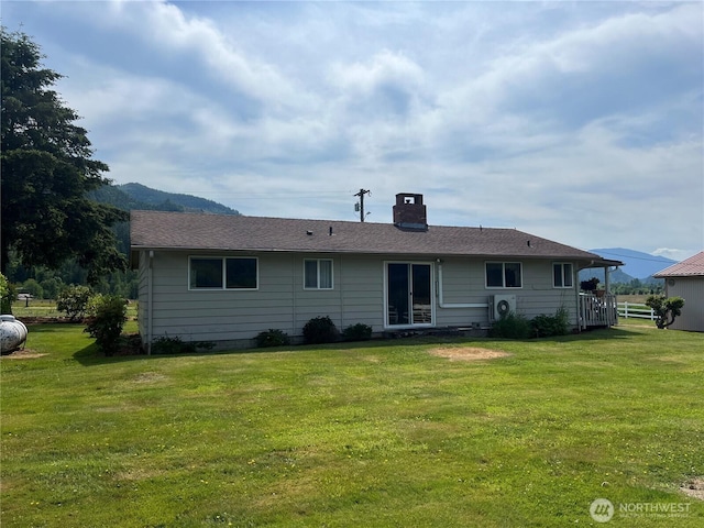 158 Skaggs Rd, Morton, WA 98356 - back of house with a chimney and a yard