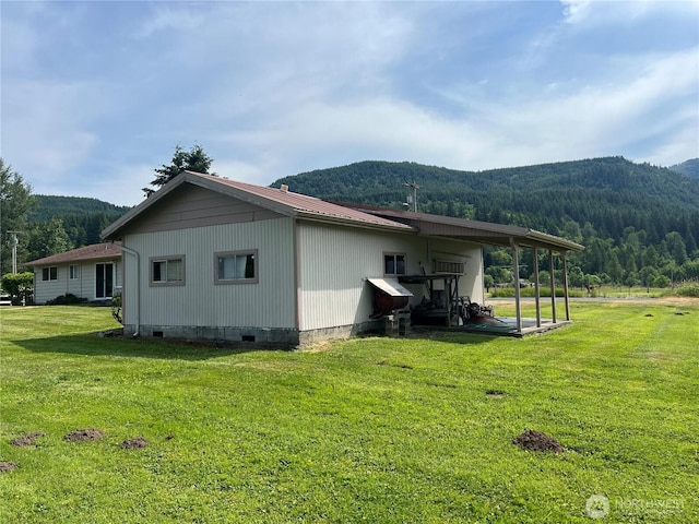 158 Skaggs Rd, Morton, WA 98356 - view of property exterior featuring a mountain view, crawl space, a lawn, and a forest view