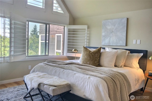 4411 Greenwood Ave N, Seattle, WA 98103 - bedroom with wood finished floors and vaulted ceiling