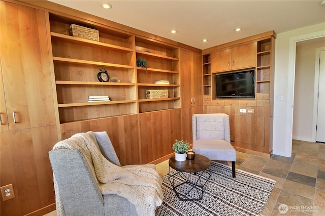 4411 Greenwood Ave N, Seattle, WA 98103 - living area with recessed lighting, stone finish floors, and built in shelves