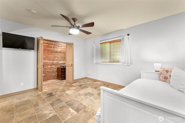 400 Sudden Valley Dr, Bellingham, WA 98229 - bedroom featuring light stone finish floors and ceiling fan