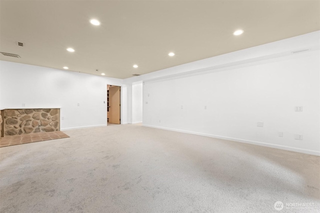 400 Sudden Valley Dr, Bellingham, WA 98229 - below grade area featuring recessed lighting, light colored carpet, and a stone fireplace