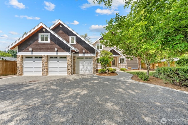 11028 E Riverside Dr, Bothell, WA 98011 - craftsman-style home featuring driveway and stone siding