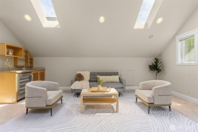 11028 E Riverside Dr, Bothell, WA 98011 - living area with wine cooler, a skylight, vaulted ceiling, light carpet, and bar