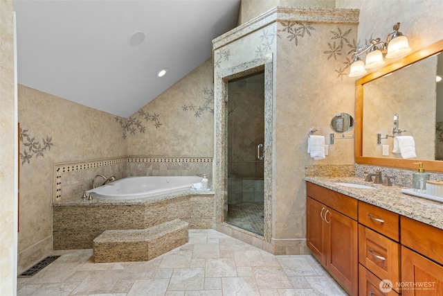 11028 E Riverside Dr, Bothell, WA 98011 - bathroom featuring a garden tub, vanity, stone tile flooring, vaulted ceiling, and a stall shower