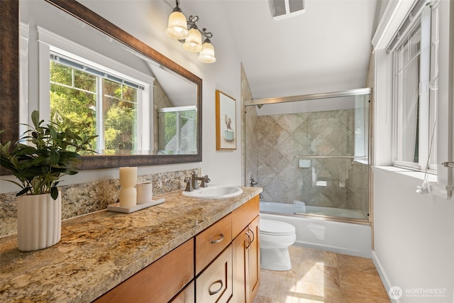 11028 E Riverside Dr, Bothell, WA 98011 - bathroom featuring vanity, bath / shower combo with glass door, and lofted ceiling