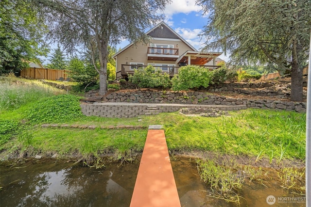 11028 E Riverside Dr, Bothell, WA 98011 - back of house featuring a deck with water view