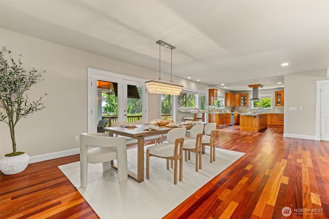 11028 E Riverside Dr, Bothell, WA 98011 - dining space featuring french doors, dark wood-style floors, and recessed lighting