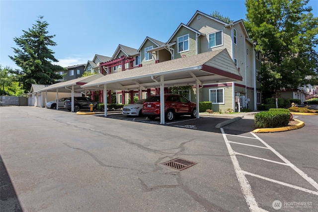 13000 Admiralty Way # D303, Everett, WA 98204 - view of front of house featuring covered parking