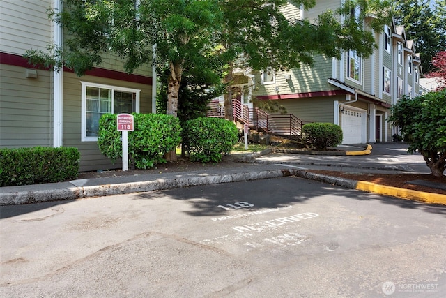 13000 Admiralty Way # D303, Everett, WA 98204 - view of front of home featuring uncovered parking