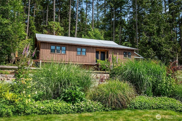 58 Pavey Blvd, Lopez Island, WA 98261 - rustic home featuring board and batten siding