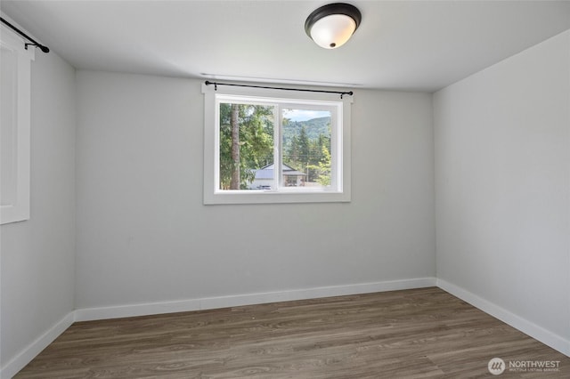 8471 Golden Valley Dr, Maple Falls, WA 98266 - empty room with wood finished floors and baseboards