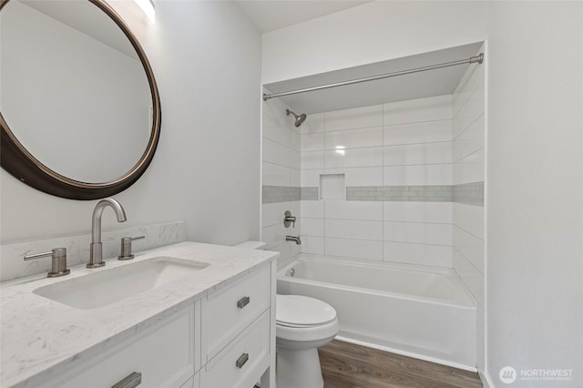 8471 Golden Valley Dr, Maple Falls, WA 98266 - full bathroom featuring wood finished floors, vanity, and shower / bathtub combination