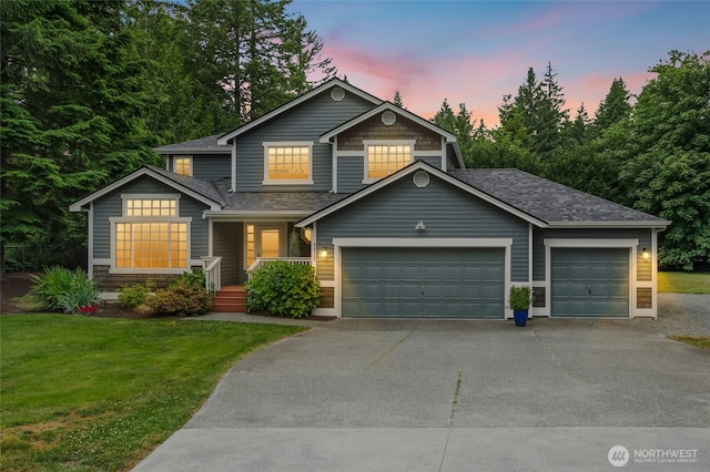43712 SE 168th St, North Bend, WA 98045 - view of front of property featuring an attached garage, asphalt driveway, a porch, and roof with shingles