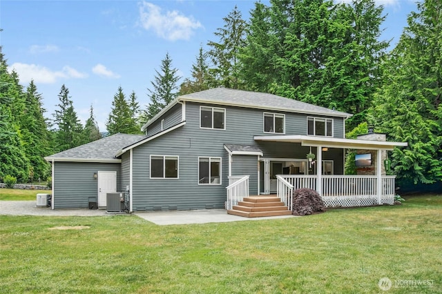 43712 SE 168th St, North Bend, WA 98045 - back of house featuring a yard, a shingled roof, and a patio