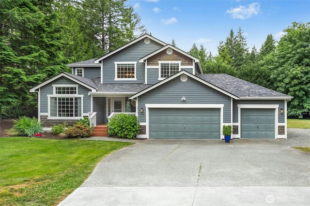 43712 SE 168th St, North Bend, WA 98045 - view of front of home with an attached garage, driveway, a shingled roof, a porch, and a front lawn