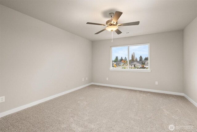 2883 74th Ln SW Unit Lot105, Tumwater, WA 98512 - carpeted empty room with ceiling fan and baseboards