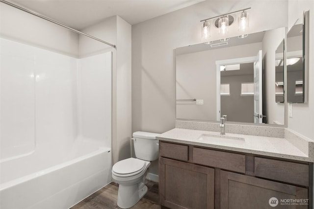 2883 74th Ln SW Unit Lot105, Tumwater, WA 98512 - full bathroom featuring vanity, shower / tub combination, and wood finished floors