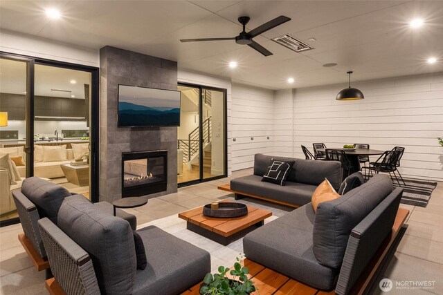 7826 115th Pl NE, Kirkland, WA 98033 - living room featuring a ceiling fan, a tile fireplace, and recessed lighting