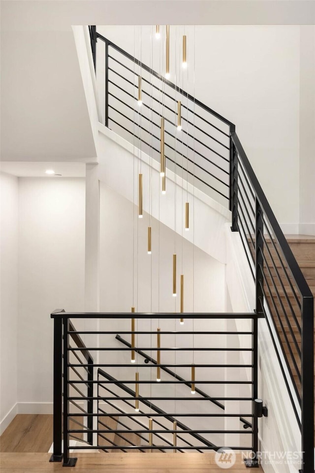 7826 115th Pl NE, Kirkland, WA 98033 - stairway featuring wood finished floors and baseboards