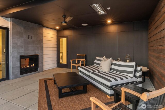 7826 115th Pl NE, Kirkland, WA 98033 - view of patio with a fireplace and a ceiling fan