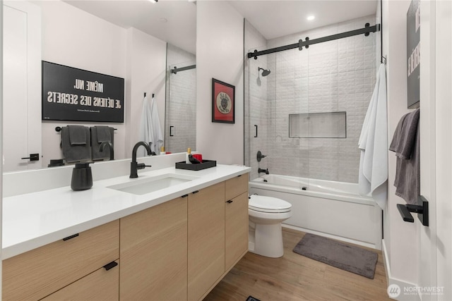 7826 115th Pl NE, Kirkland, WA 98033 - full bathroom with vanity, wood finished floors, and enclosed tub / shower combo