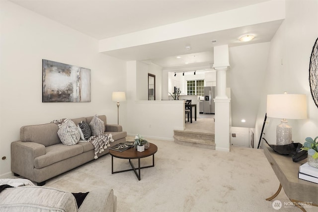 1900 132nd Ave SE Unit I-23, Bellevue, WA 98005 - living room featuring light colored carpet and ornate columns