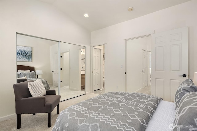 1900 132nd Ave SE Unit I-23, Bellevue, WA 98005 - bedroom featuring light colored carpet, high vaulted ceiling, and ensuite bath