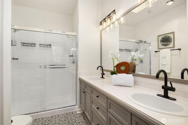 1900 132nd Ave SE Unit I-23, Bellevue, WA 98005 - full bathroom with a stall shower, double vanity, and tile patterned flooring